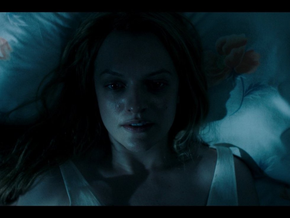 Elisabeth Moss as Offred in The Handmaid's Tale