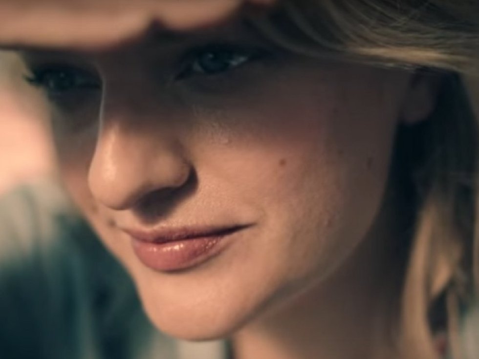 Elisabeth Moss as Offred/June in The Handmaid's Tale