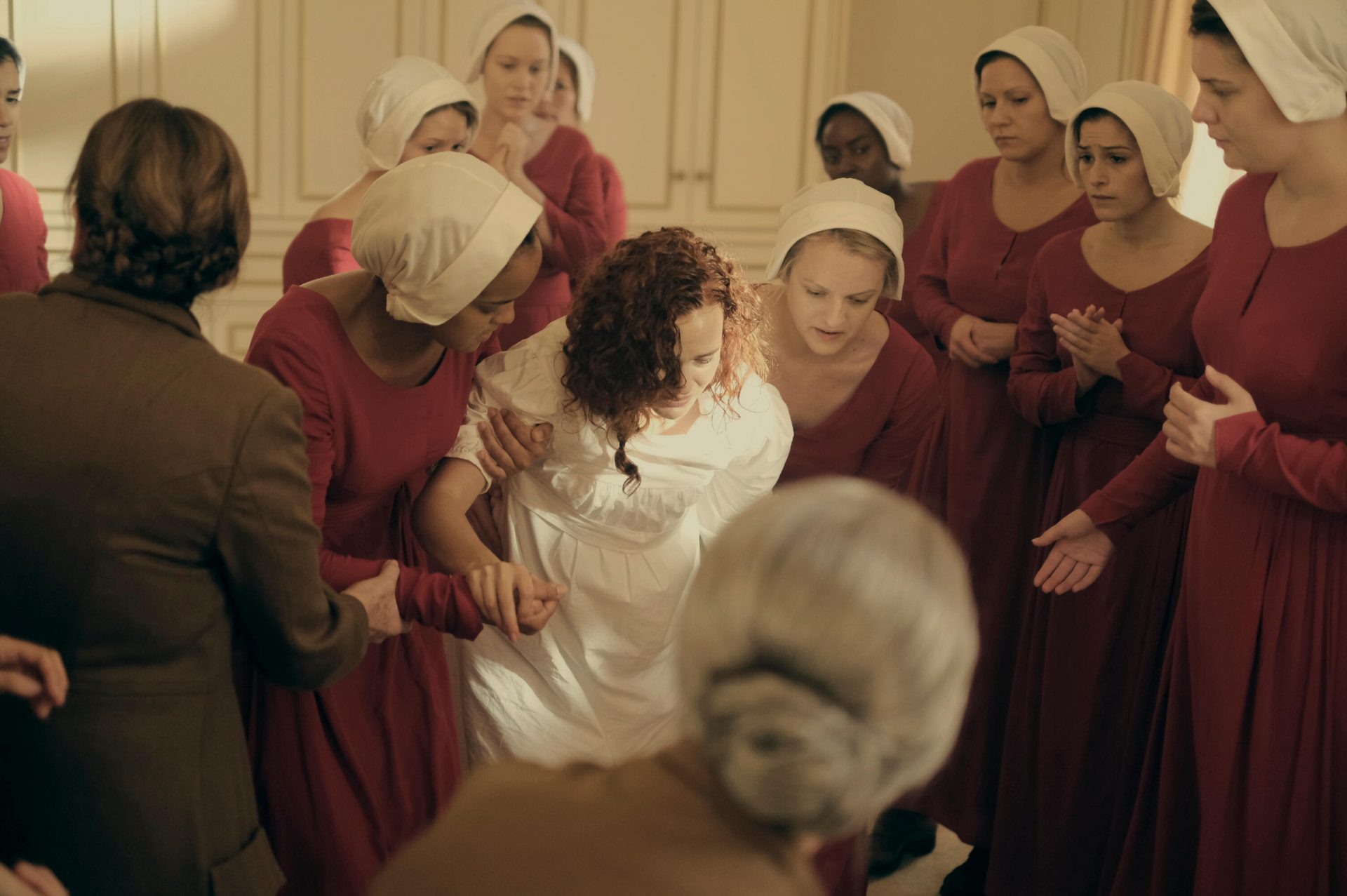 The Handmaid's Tale: June and her fellow Handmaids assist Janine at the birth of her baby